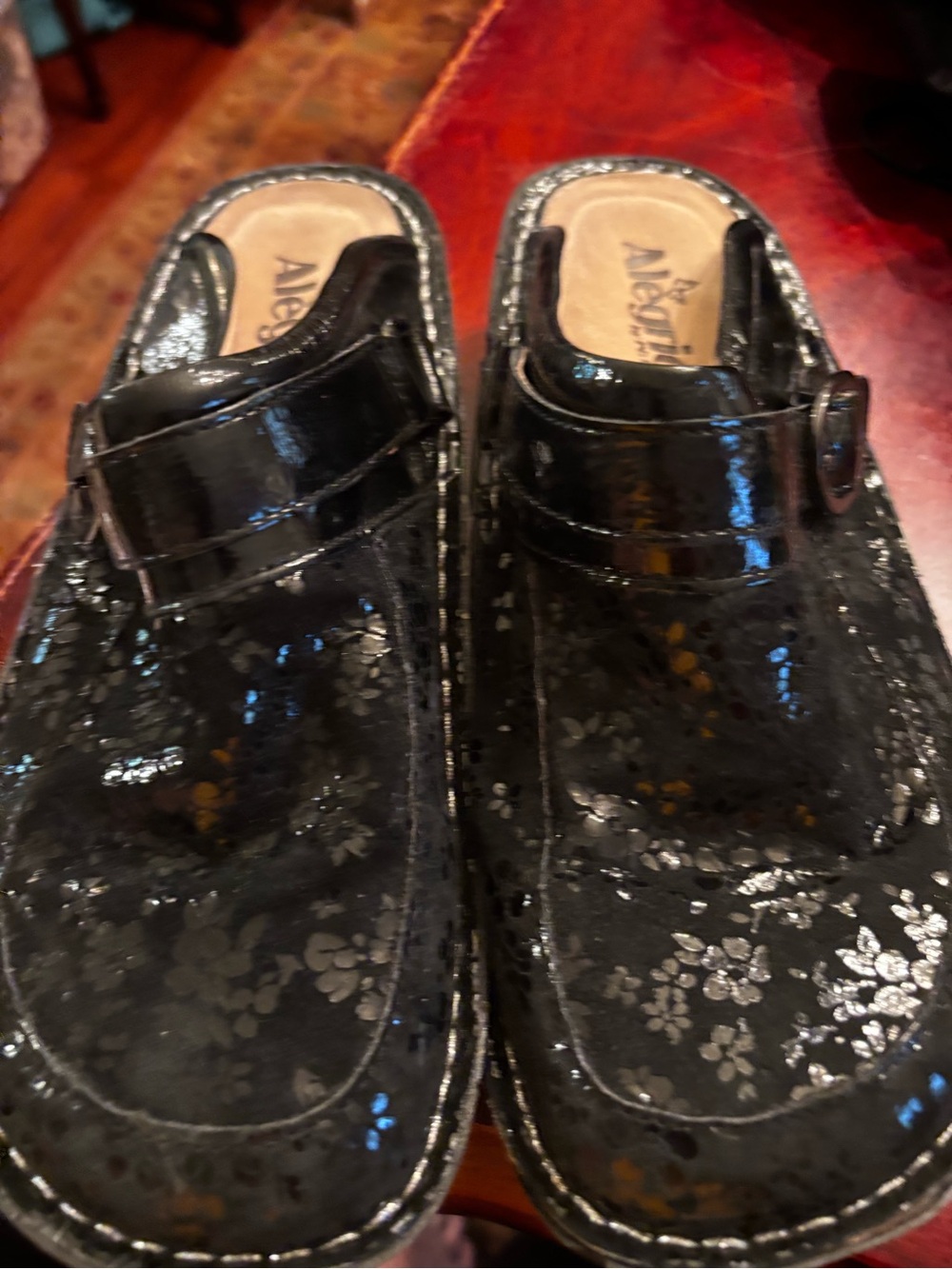 Black Patent Floral Slip-On Clogs with Adjustable Strap